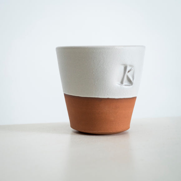 Oval ‘K’ terracotta beakers